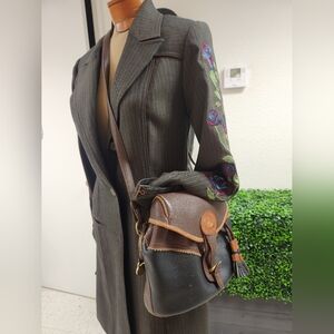 Dooney & Bourke Teton vintage RARE Drawstring saddle tasseled Pebbled crossbody.